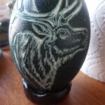 Cinny emu egg with elk carving